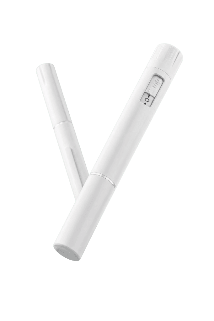 Two white GLP-1 injector pens crossed